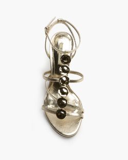 Sandalias oro de tacón alto mujer con detalle metálico en empeine