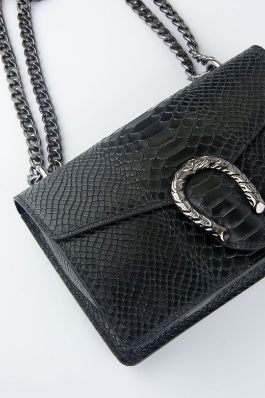 Sac en cuir de crocodile avec fer à cheval noir
